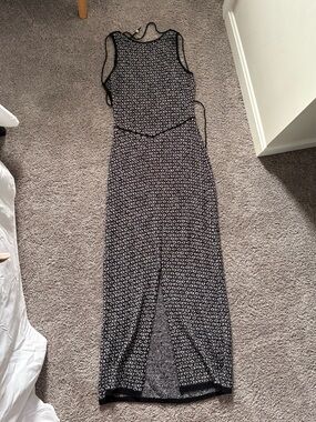 Free people dress. Black and white with bead open back.